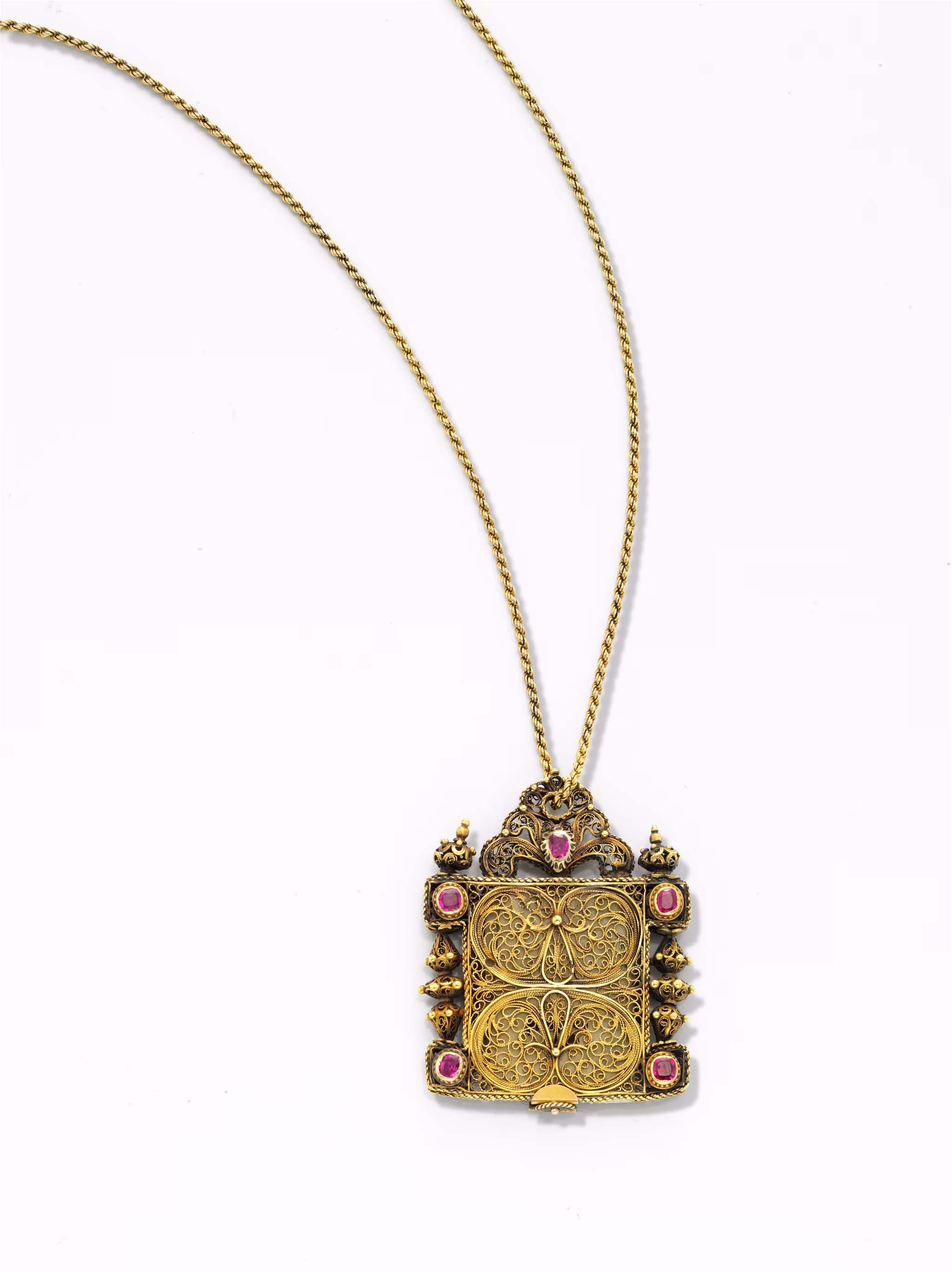 Amulet containing scripture on parchment, Unsigned, Late 17th cent, Gold, rubies © Tony Falcone