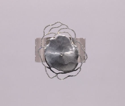 Silver poppy cuffs 
