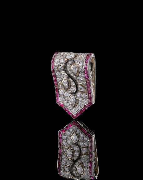 Clip, ca. 1925, Platinum, enamel, ruby, and diamond, Private Collection