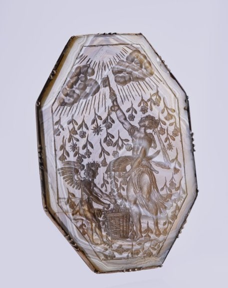 France, 17th century Abundance opening the sky to make flowers rain down Agate intaglio Guy Ladrière Collection