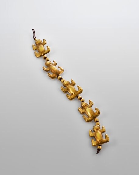 Gold frog-shaped ornaments, 6th to 5th century BCE, Courtesy of the Mengdiexuan Collection. Photo Picspark Co