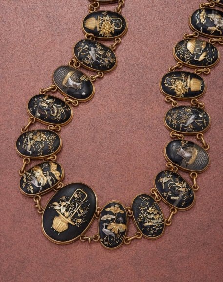 Necklace composed of elements resembling the cap of the  samurai sword (kashira) Japan, 1800s Gold and silver-gilt shakudo  Private Collection