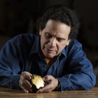 Daniel Brush explaining the Scholar's Table piece - Photo Credit Nathan Crooker.jpg