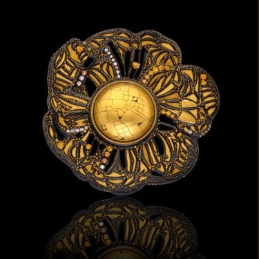 Mosaic brooch, Daniel Brush, 1986, Steel, Gold, Round Colorless and Fancy Colored Diamonds (Gold Mosaic Dome), © L’ÉCOLE Van Cleef & Arpels.jpg Mosaic brooch, Daniel Brush, 1986, Steel, Gold, Round Colorless and Fancy Colored Diamonds (Gold Mosaic Dome), © L’ÉCOLE Van Cleef & Arpels.jpg