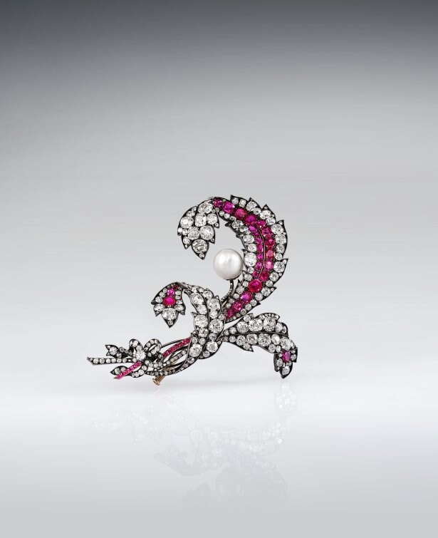 Köchert brooch in Exhibition "An Eye for Beauty, the Illuminata Jewelry Collection" in Hong Kong.  Pearl, diamonds, rubies, silver, and gold