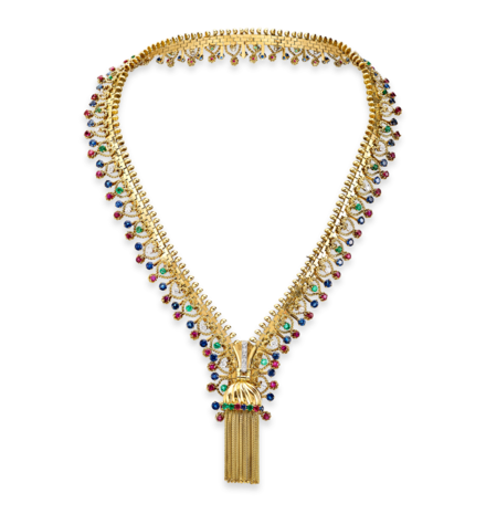 Van Cleef & Arpels    Zip necklace transformable into a bracelet 1951​  Yellow gold, platinum, sapphires, emeralds, rubies, diamonds​  Van Cleef & Arpels Collection 