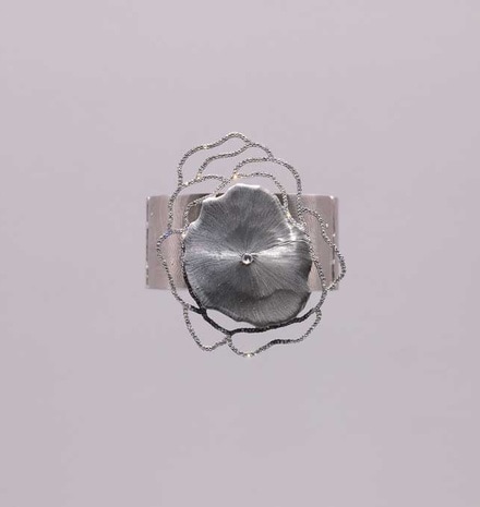 Detail of a work of Daniel Brush in steel and diamonds