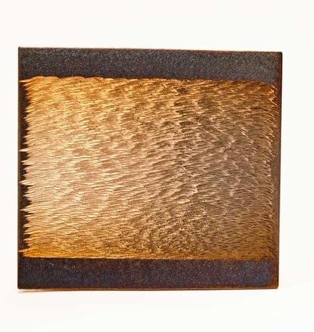 Steel engraved by hand; golden light revealed