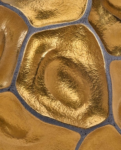 Daniel Brush's Orb piece, in gold and steel
